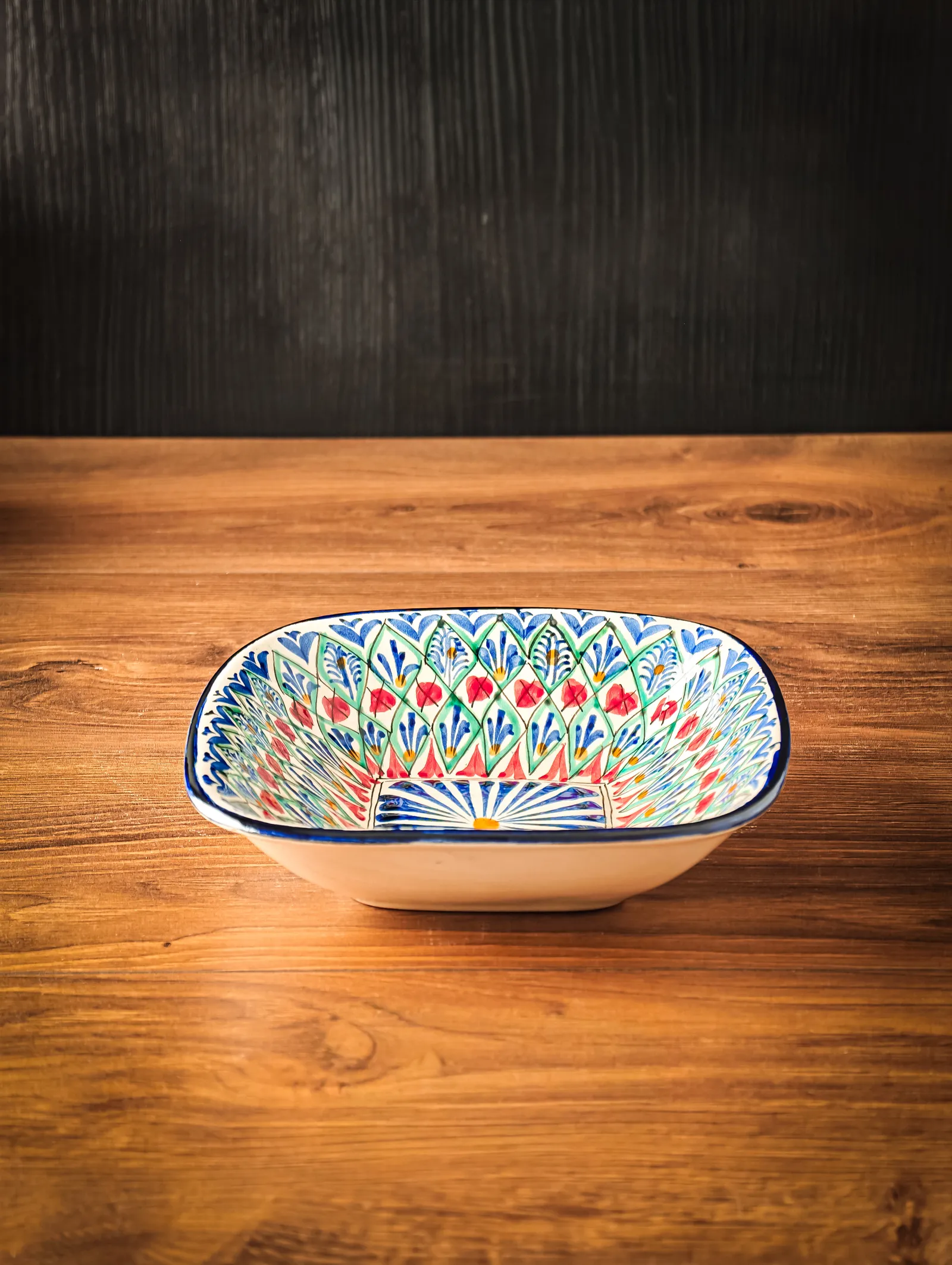 Uzbek bowl with traditional hand-painted colorful patterns