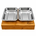Bamboo cutting board with pull-out stainless steel trays
